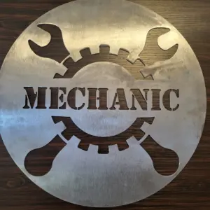 metal wall art of a mechanic sign