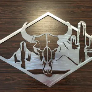 Metal wall art of a skull in a desert